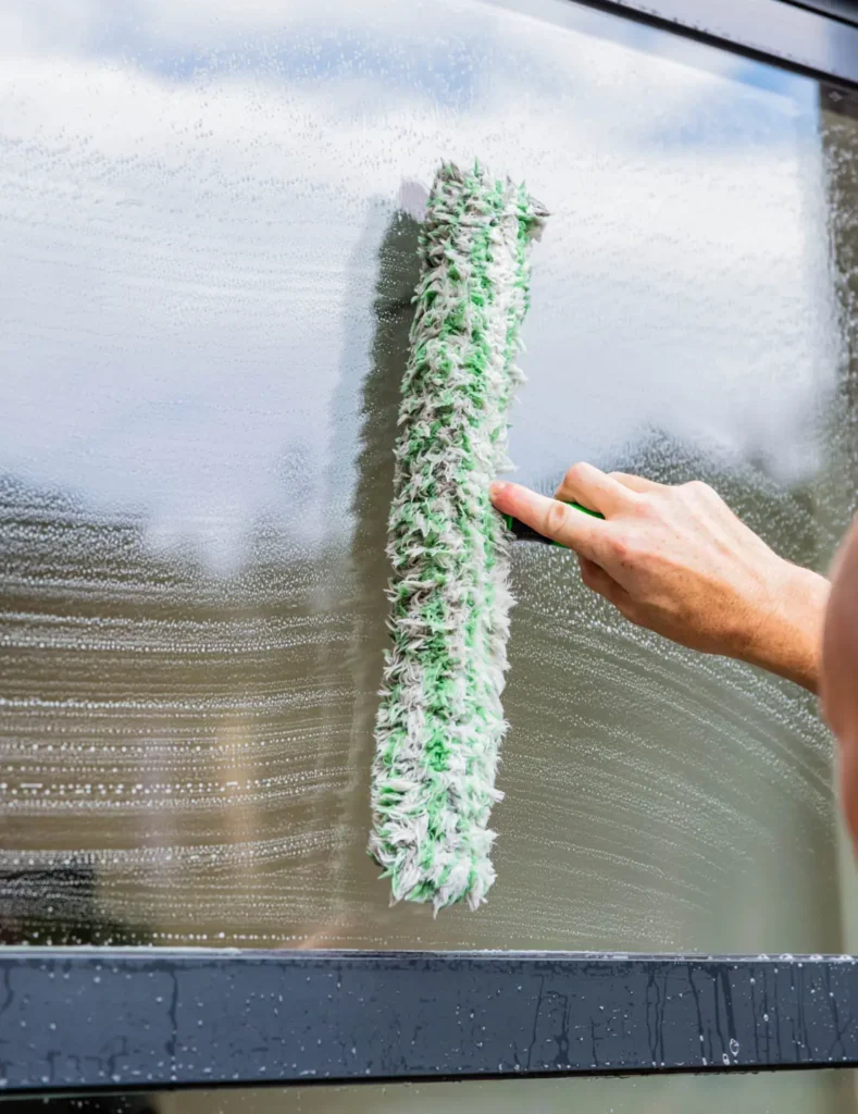 Glasbewassing Menges ruit wassen